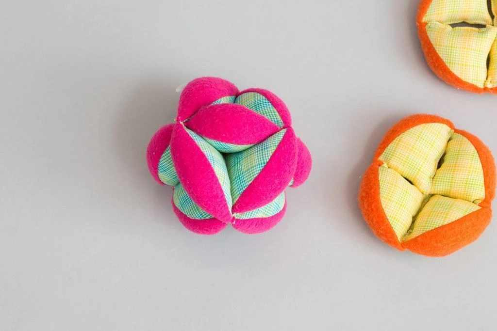 Zeki Learning Plush Puzzle Ball - Pink 3 Zeki Learning Plush Puzzle Ball - Pink