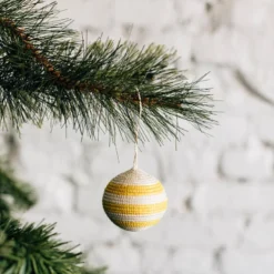 Azizi Life Striped Woven Ball Ornament - Yellow + Natural
