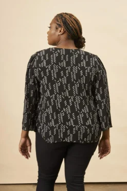 Symbology Stylized Feather Tie Knot Blouse - Black + Cream Clothing